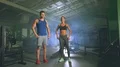 The sportsman and sportswoman stand in the fitness center 4k or 4k+ Resolution