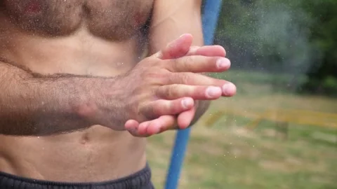 Sportsman performing dynamic training workout, showcasing hand movements Stock Footage 317234314