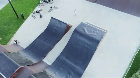 Sportsman rides bike along steep ramp on... | Stock Video | Pond5