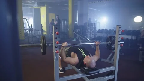 A sportsman warms up before the main training session. Stock Footage 236384456