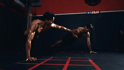 Sportsman workout together exercise push-ups crossfit in the fitness Stock Footage 200513380