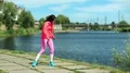Sportswoman does physical exercise and runs on the spot HD Footage