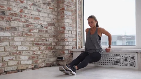 Sportswoman is doing pushups. Video stock 81075286