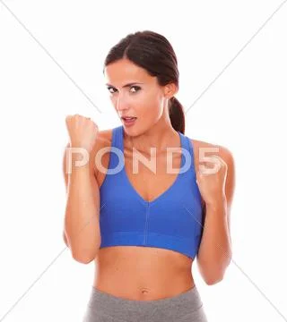 Sporty cheerful lady with happy gesture Stock Photos