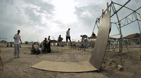 Sporty Guy is Practicing Element Of Free Running on The Coast. Stock Footage 60704376