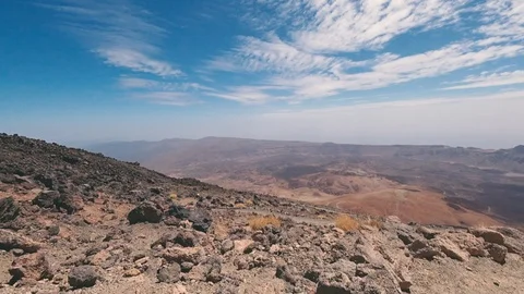 Sporty man walking on volcano path slow motion Stock Footage 116659896