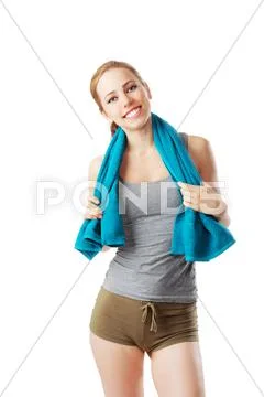 Sporty woman after fitness workout with blue towel Stock Photos