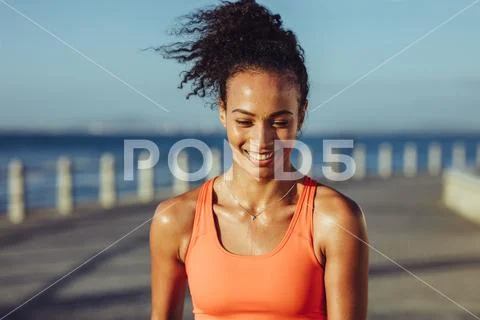 Sporty woman taking a break while exercising Stock Photos