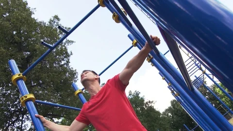 Sporty Young Man Doing Pull Ups Exercise. Stock Footage 94743677