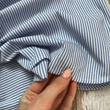 Spot on clothes close-up Stock Photos