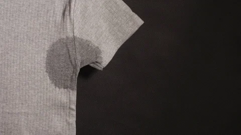 Spot on a gray t-shirt is drying (time lapse) Stock Footage 73926499