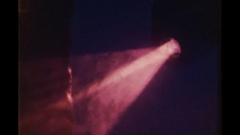 Spot light. concert light. shot on 8mm camera Stock Footage 129117843