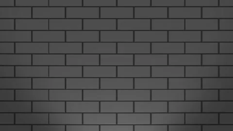 A spot of light creeps up the gray brick wall. Stock Footage 105852559