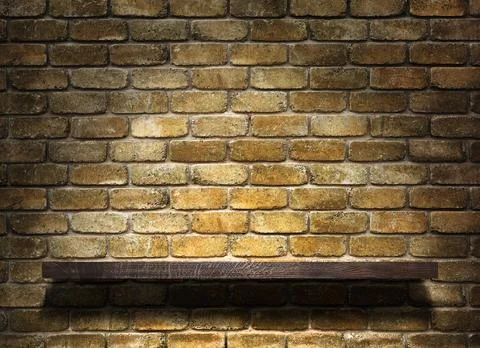 Spot light illuminated shelf on old brick wall 스톡 일러스트