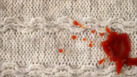 Spot of tomato paste or ketchup on clothes. Stock Footage 146545017