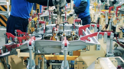 Spot welding is being done on car elements in the factory unit Vídeo Stock 146514080
