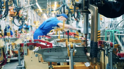 Spot welding of car part held in the car-making factory. Automobile factory, car Stock Footage 141120984