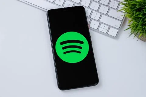 Spotify app logo on a smartphone screen Stock Photos