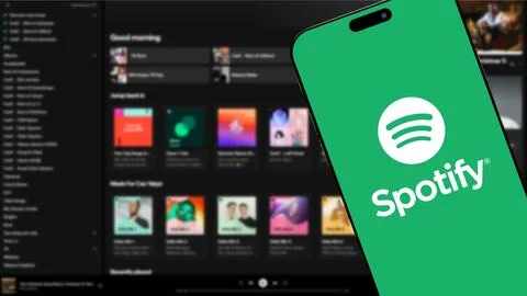 Spotify logo on smartphone screen Stock Photos