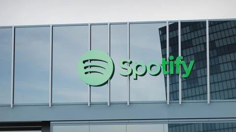 Spotify Stock data presented on the logo of the office facade editorial Stock Photos