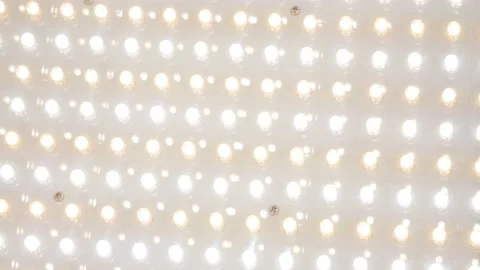 Spotlight bulbs light up. Stock Footage 235337733