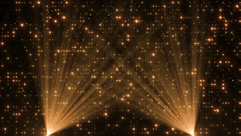 A spotlight illuminates the background of the stage. Spotlight with flying Stock Footage 276555591