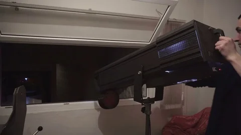 Spotlight operator tracks actors around the stage Stock Footage 71771185