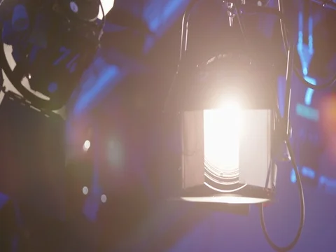 Spotlight in a professional TV-Studio beeing switched on Stock Footage 75015817