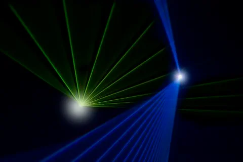 Spotlight shining on a black background Stock Photos