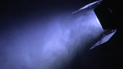 Spotlight shining through stage smoke. Stock Footage 210478486