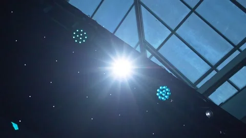 A spotlight on stage shines into the camera Stock Footage 226888692