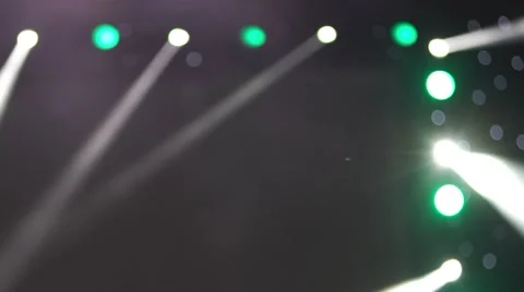 Spotlight strike through the darkness on stage. Stage lights. Several projectors Video stock 65212671