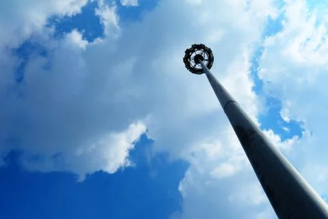 Spotlight Tower Pole in Cloudy Day. Stock Photos