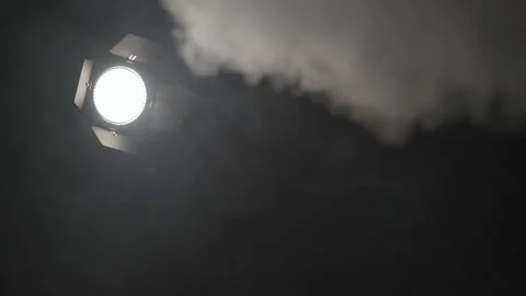 Spotlight in white clouds of smoke Vídeo Stock 113012765