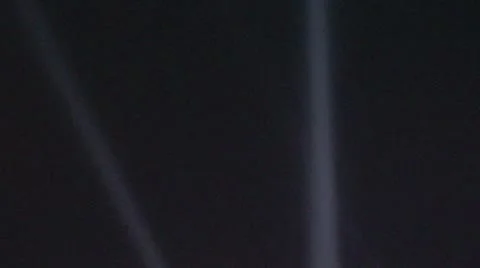 Spotlights in Night Sky, Tilt Down to Light Tower Stock Footage 8913623