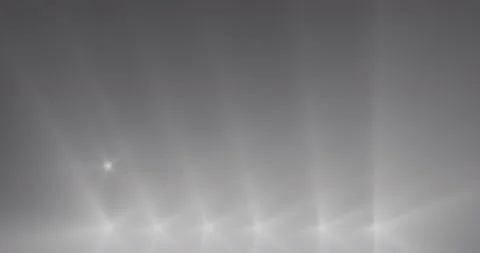 Spotlights sequentially begin to shine brightly and go out. Stock Footage 124703068