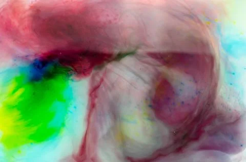 Spots, Streams and dots of different colors of watercolors in transparent wat Stock Illustration