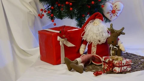 Spotted Photo Frames Are Put Among Haand Made Toys Including an Amazing Santa Stock Footage 72548299