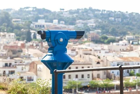 Spotting scope on the observation deck. Clear summer day. Photos