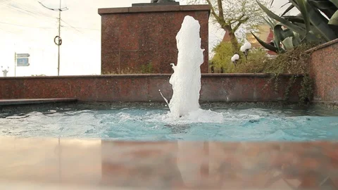 Spouting fountain in the park Stock Footage 108135850
