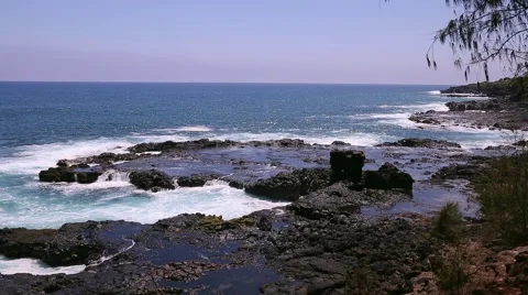 Spouting Horn Beach Park waves crashing on Lava Rock Stock Footage 51989176