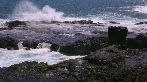 Spouting Horn Beach Park waves crashing on Lava Rock Stock Footage 51993110
