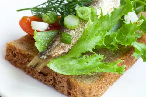 Sprats on the bread Stock-Fotos