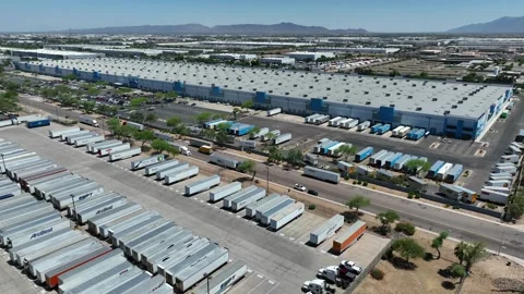 Sprawling Amazon warehouse and fulfillment center. Aerial establishing Vídeos de archivo 247604693