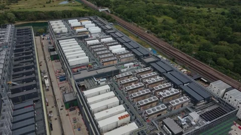 Sprawling Data Center Complex With Train Passing Nearby Stock Footage 339645138