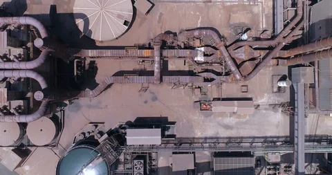 Sprawling dirty industrial complex with installations filling frame aerial 4K Stock-Footage 85957690