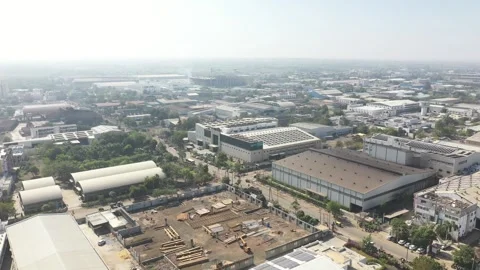 Sprawling industrial territory showing ongoing construction and completed Stock Footage 331633229