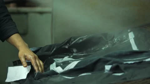 Spray black jacket Leather factory Stock Footage 202462652