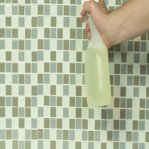 Spray bottle on bathroom tile Stock Footage 69405335