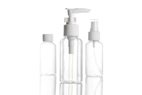 Spray bottle, empty pump clear plastic container cosmetic soap and mineral Stock Photos